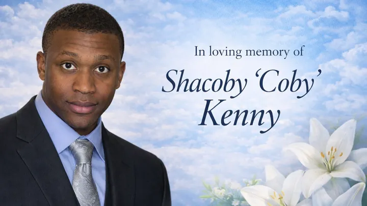 A IMAGE OF SHACOBY KENNY AGAINST CLOUDS & FLOWERS. TEXT READS: IN LOVING MEMORY OF SHACOBY 'COBY' KENNY